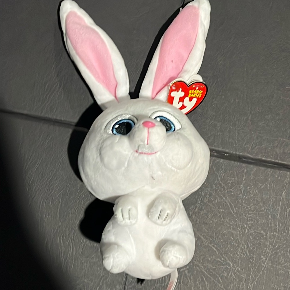 One “snowball” TY beanie baby doll. With tags.
